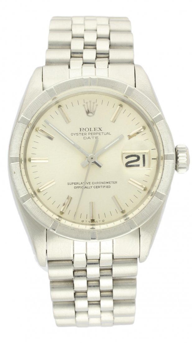 A GENTLEMAN'S STAINLESS STEEL ROLEX OYSTER PERPETUAL: A GENTLEMAN'S STAINLESS STEEL ROLEX OYSTER PERPETUAL DATE BRACELET WATCH CIRCA 1967 D: Silver dial with silver batons, date aperture. M: Automatic movement signed Rolex. C: Oyster case with milled bez