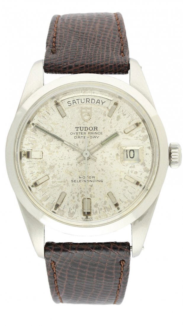 A LARGE SIZE GENTLEMAN'S STAINLESS STEEL ROLEX TUDOR: A LARGE SIZE GENTLEMAN'S STAINLESS STEEL ROLEX TUDOR OYSTER PRINCE DAY-DATE WRISTWATCH CIRCA 1970s D: Silver dial with silver batons, day & date apertures. M: 21 jewel automatic movement signed Tudor