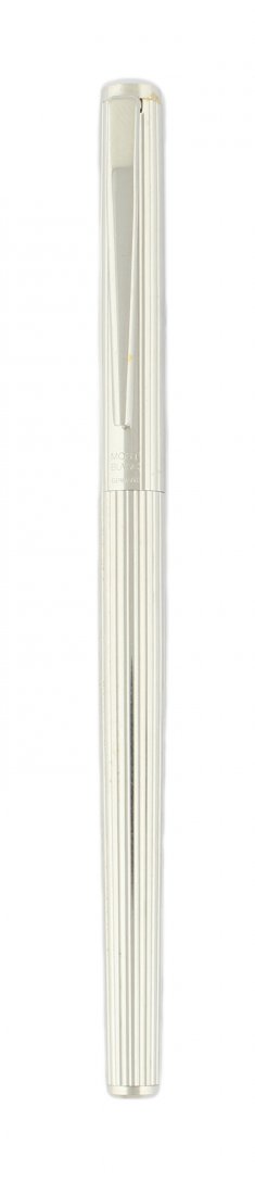 A SILVER PLATED MONTBLANC PEN WITH TRIANGULAR SYMBOL: A SILVER PLATED MONTBLANC PEN WITH TRIANGULAR SYMBOL MADE FOR THE MIDDLE EAST MARKET Circular case with a faceted/ribbed design, 14k solid gold nib marked 585.