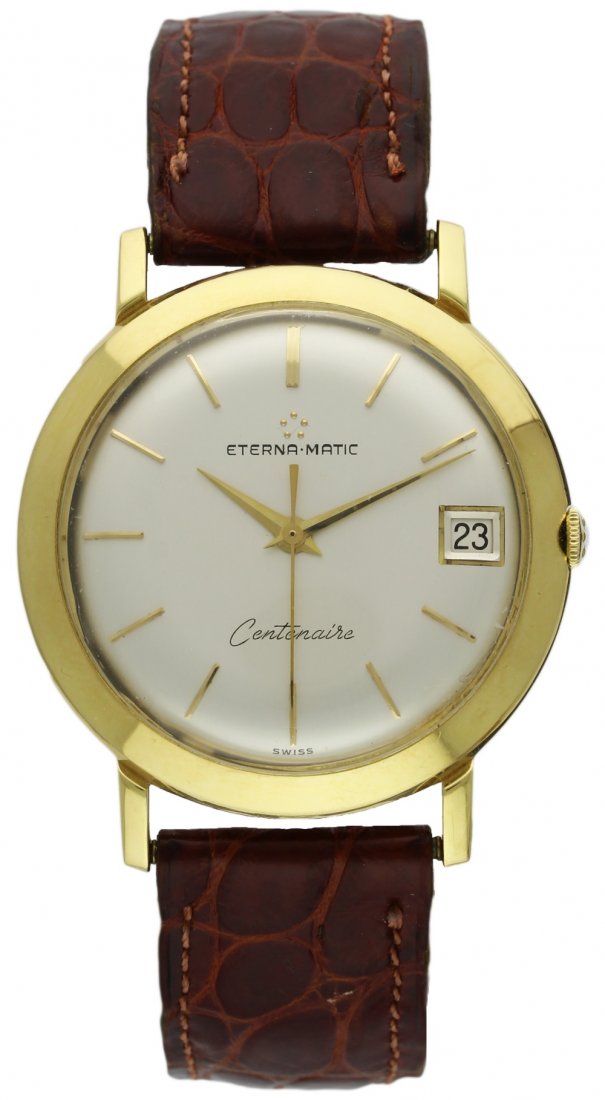 A GENTLEMAN'S 18K SOLID GOLD ETERNA MATIC CENTENAIRE: A GENTLEMAN'S 18K SOLID GOLD ETERNA MATIC CENTENAIRE WRISTWATCH CIRCA 1960s D: Silver dial with gilt batons and date aperture. M: 21 jewel automatic movement signed Eterna Matic & numbered. C: Circula