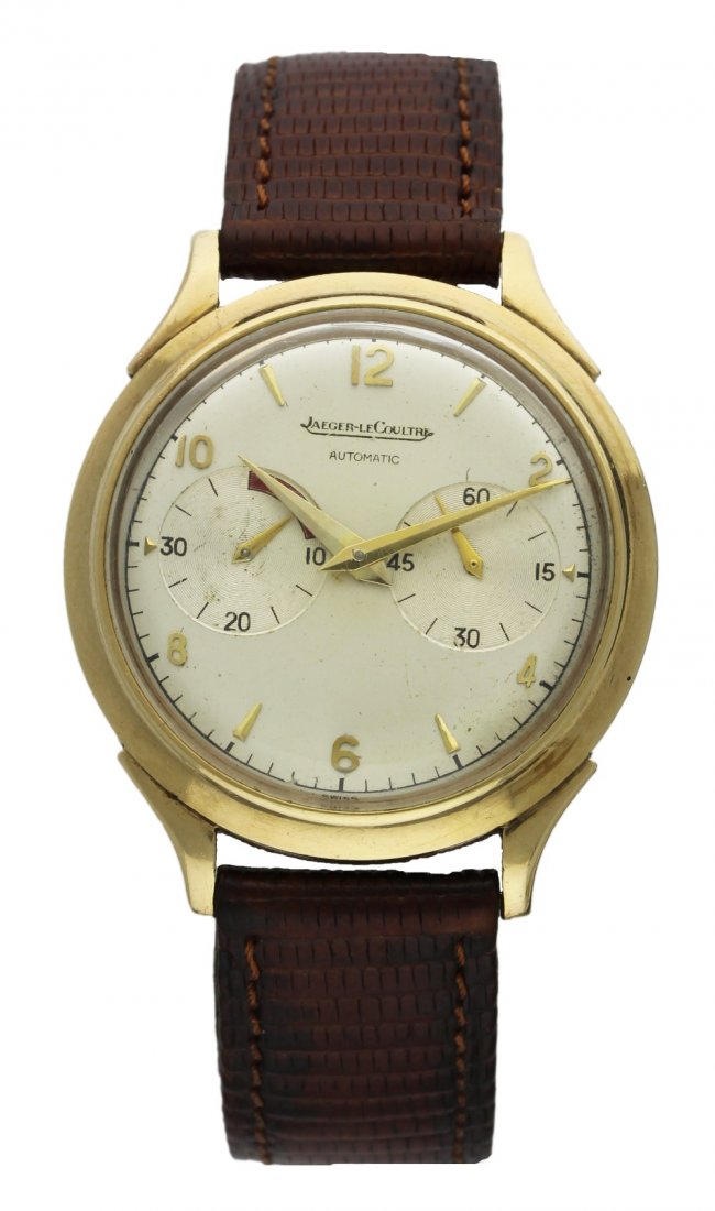 A RARE GENTLEMAN'S 9CT SOLID GOLD JAEGER LECOULTRE: A RARE GENTLEMAN'S 9CT SOLID GOLD JAEGER LECOULTRE FUTURMATIC WRISTWATCH CIRCA 1950s D: Silver dial with raised gilt Arabic numerals & dagger" batons, subsidiary seconds & power reserve indicator. M: 