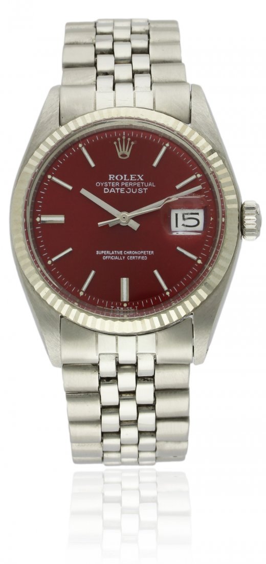 A GENTLEMAN'S STEEL & GOLD ROLEX OYSTER PERPETUAL: A GENTLEMAN'S STEEL & GOLD ROLEX OYSTER PERPETUAL DATEJUST BRACELET WATCH CIRCA 1970, REF. 1601 D: Sunburst red dial with white inlaid silver batons, date aperture. M: Automatic chronometer movement s