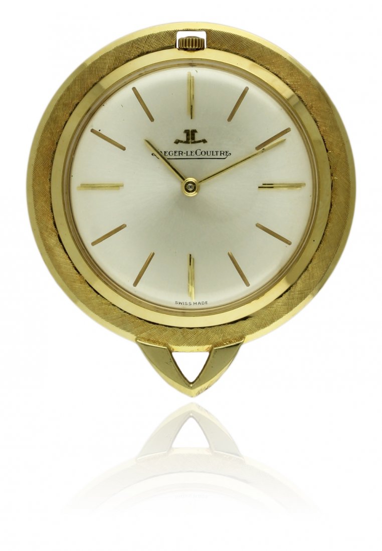 A 18K SOLID GOLD JAEGER LECOULTRE PENDANT WATCH CIRCA: A 18K SOLID GOLD JAEGER LECOULTRE PENDANT WATCH CIRCA 1970s, REF. 1941 D: Silver dial with gilt batons. M: Manual wind movement, signed Jaeger LeCoultre & umbered. C: Circular bark effect case, signed