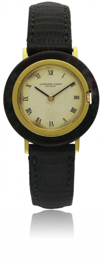 A RARE GENTLEMAN'S 18K SOLID GOLD & AGATE AUDEMARS: A RARE GENTLEMAN'S 18K SOLID GOLD & AGATE AUDEMARS PIGUET WRISTWATCH CIRCA 1970s, REF. 34032 D: Silver dial with applied Roman numerals. M: Manual wind movement, signed Audemars Piguet. C: Circular ca