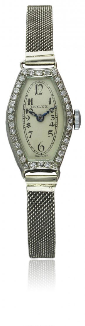 A FINE LADIES 18K SOLID WHITE GOLD & DIAMOND ROLEX: A FINE LADIES 18K SOLID WHITE GOLD & DIAMOND ROLEX COCKTAIL WATCH CIRCA 1920s D: Silver dial with applied Roman numerals. M: 15 jewel manual wind movement signed Rolex Prima, Timed 6 Positions. C: Ton