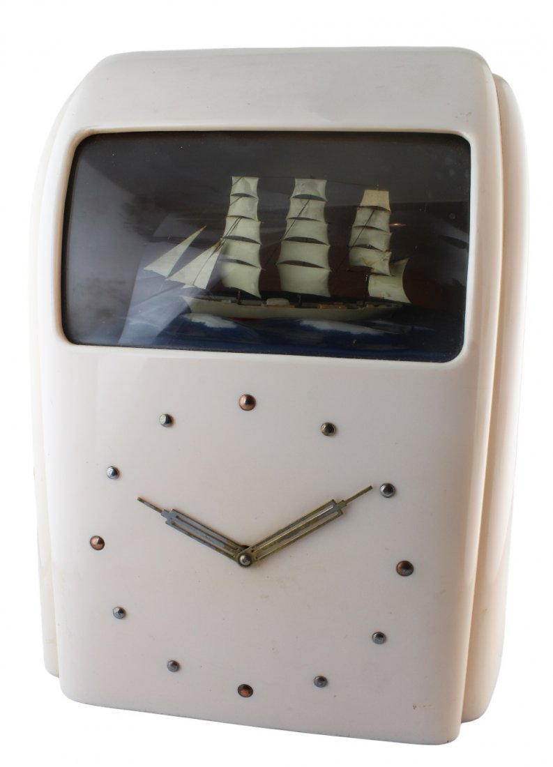 A RARE ART DECO ELECTRIC VITASCOPE ROCKING SHIP CLOCK