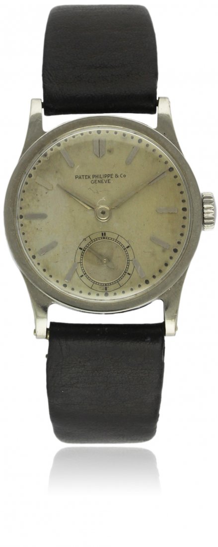 A RARE GENTLEMAN'S STAINLESS STEEL PATEK PHILIPPE: A RARE GENTLEMAN'S STAINLESS STEEL PATEK PHILIPPE CALATRAVA WRISTWATCH CIRCA 1930s D: Silver dial with silver batons, outer minute markers, subsidiary seconds. M: Manual wind movement signed Patek Phi