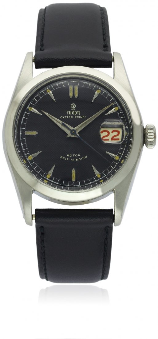 A GENTLEMAN'S STAINLESS STEEL ROLEX TUDOR OYSTER PRINCE: A GENTLEMAN'S STAINLESS STEEL ROLEX TUDOR OYSTER PRINCE WRIST WATCH CIRCA 1950s, REF. 7914 D: Black ''honeycomb'' dial with silver ''dagger'' batons, red date display, dauphine hands. M: 17 jewel self
