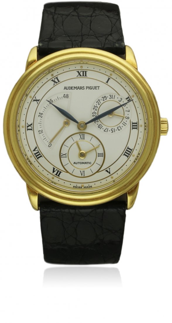 A FINE GENTLEMAN'S 18K SOLID GOLD AUDEMARS PIGUET DUAL: A FINE GENTLEMAN'S 18K SOLID GOLD AUDEMARS PIGUET DUAL TIME WRIST WATCH DATED 1991, REF. BA25685/002, WITH AP TRAVEL BOX, BOOKLET & ORIGINAL PAPERWORK D: White dial with Roman numerals, subsidiary dua