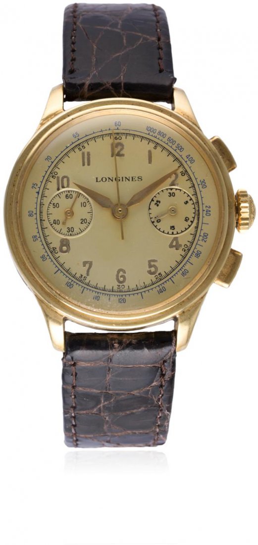 A GENTLEMAN'S 18K SOLID GOLD LONGINES 13ZN FLYBACK: A GENTLEMAN'S 18K SOLID GOLD LONGINES 13ZN FLYBACK CHRONOGRAPH WRIST WATCH CIRCA 1940 D: Champagne dial with gilt Arabic numerals & "dagger" hands, double register recording minutes & continuous secon