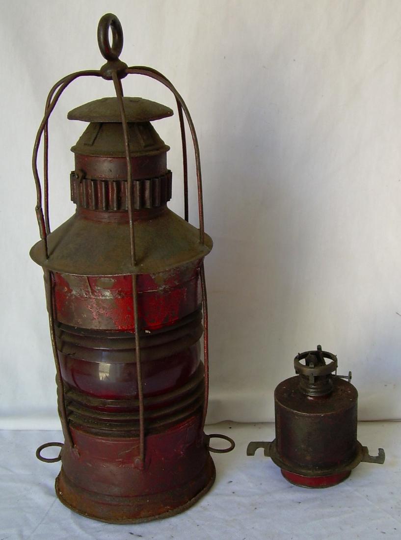 Ball Signal Lamp: New England was an area that used many ball signals. During the day, balls were used. At night this type of lamp was used to indicate a number or position of balls on a signal mast. It looks nautical 