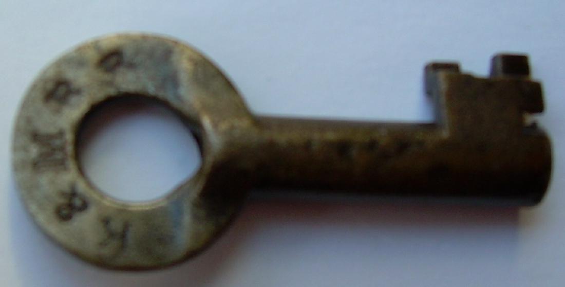 Kanawha & Michigan Steel Car Key: An interesting steel key made by Bohannan with an additional "C" for car on the reverse. This is a New York Central predecessor from Michigan. Odd bit.