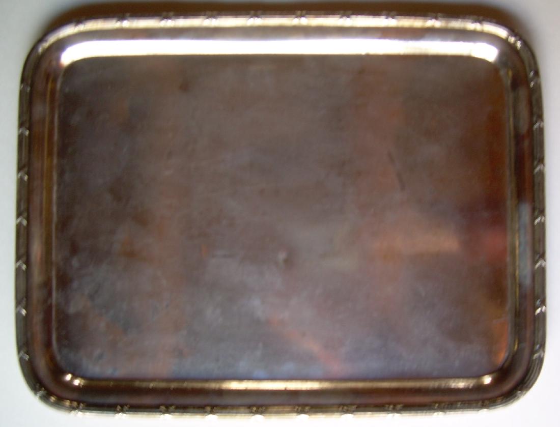 Pullman Silver Tray 12" by 9" 1929: A Pullman Company tray made by International Silver in 1929. They used a date code of 2 digits in a box. This pieces has [29]. It measures 12" by 9 1/2" and it has dings and a few scratches and dents.