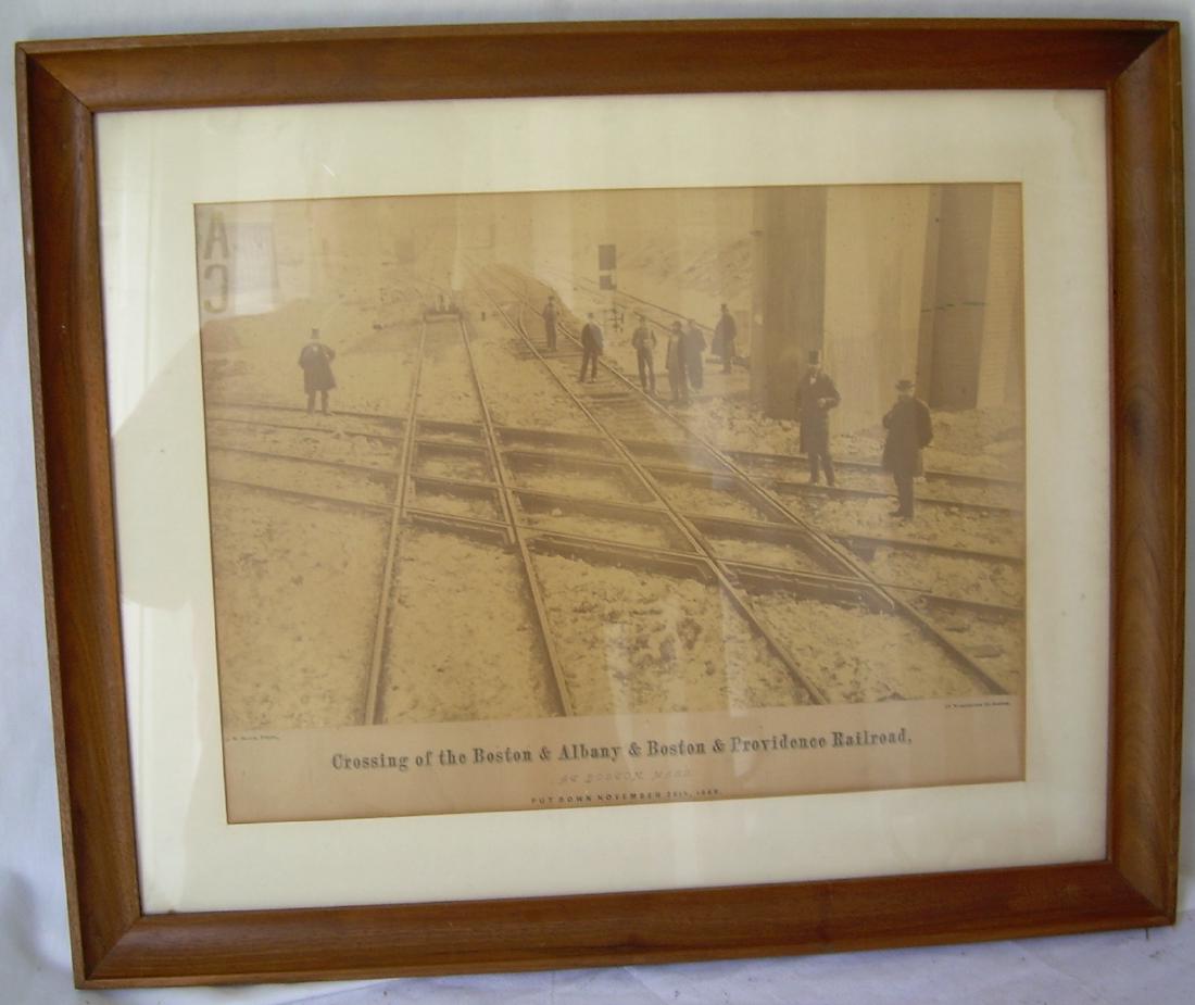 Framed 1869 Boston & Albany / Providence Crossing: A very old Boston photograph showing a double diamond track crossing of the Boston & Albany and Boston & Providence Railroads. Officials are on scene for the photograph. The mat reads: "Put Down Novem