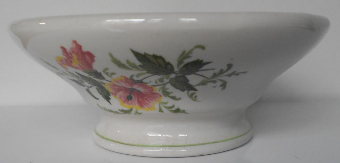 Atlantic Coast Line "Flora" China Compote: An Atlantic Coast Line Railroad china compote with footed base. It's in the "Flora of the South" pattern. It was made by Buffalo and has the full backstamp with flower names: Hibiscus, Jessamine, Poin