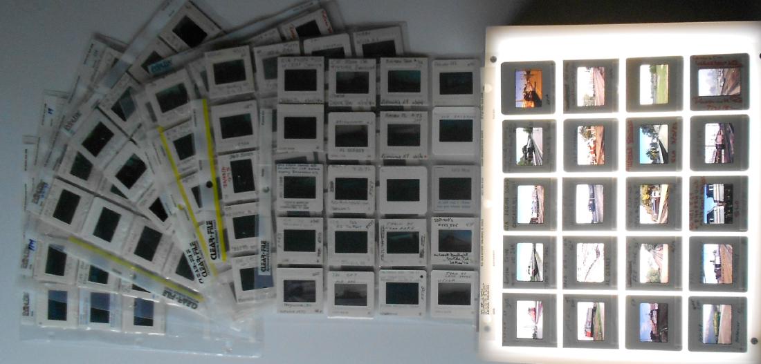 Railroad Locomotive Color Slides (218): A group of original color slides that are in a binder that has protective plastic insert sheets that hold 20 slides per sheet. Expect diverse geography. This group features diesel locomotives from Cla