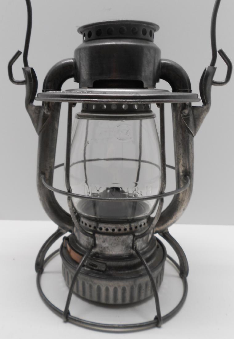 Clean New Haven Vesta Lantern Cast Globe: This is the nicest New Haven Vesta lantern that I have ever seen. It has a date code of S-12-34. It has the standard NYNH&H (without RR) stamping on the lid. This lack of RR is standard. It is very cl