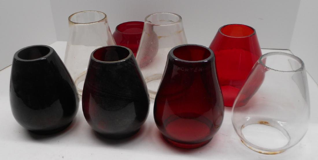 8 Unmarked Railroad Lantern Globes: e/b, Amber #39: A large group of 8 railroad style globes. None have railroad markings. (1) Amber 5 3/8" extended base - deep root beer color, thick (2) Red cast extended base 5 3/8", Red 5 3/4" "Porter" cast on top r