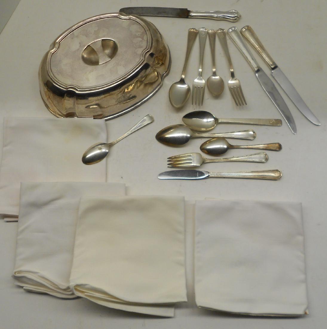 Rock Island, IC, Pullman Silver & Linen: A large group of silver & linen: Illinois Central hot food cover 10 1/4" by 7 1/4" - nice side logo, 4 Rock Island napkins, Illinois Central spoon, 5 Pullman flatware, 7 Rock Island flatware. About 18