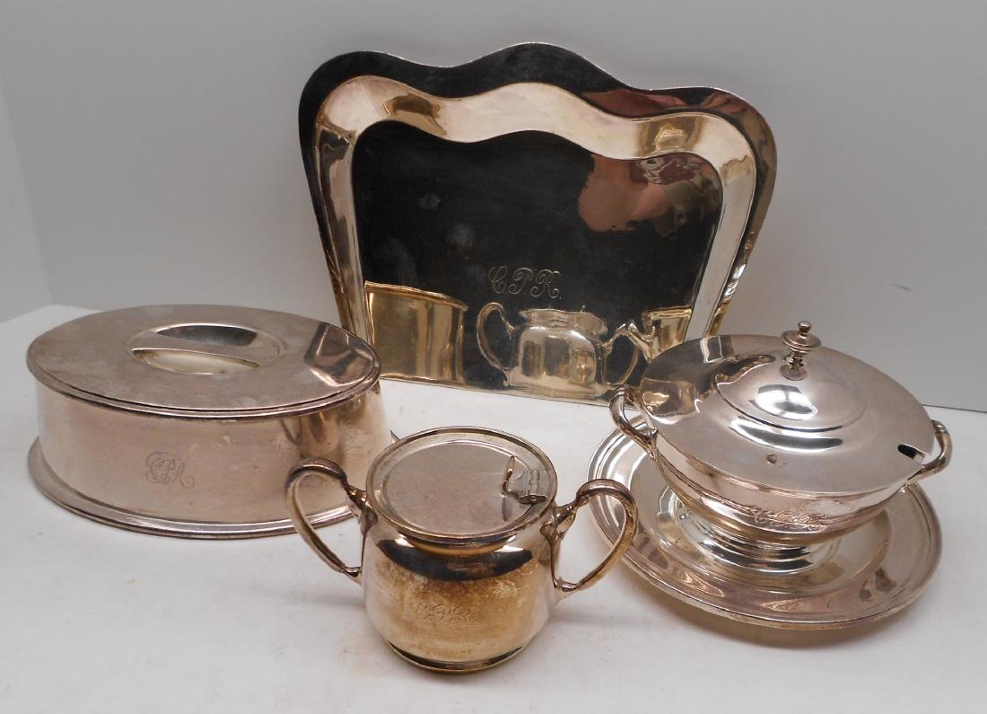 Canadian Pacific Railway Silver (4): 4 pieces of Canadian Pacific Railway silver holloware. A square crumber, oval hot food cover, casserole with fixed base, covered sugar bowl. All have the CPR side logo.