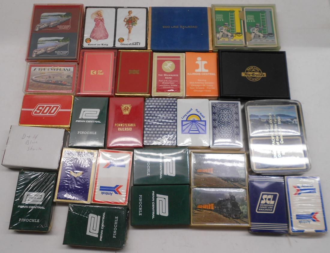 34 Decks of Railroad Playing Cards: A large group of railroad playing cards. Some are double decks, some singles. Many are sealed in original cellophane. This group has some Brotherhood related decks. Several different railroads are rep