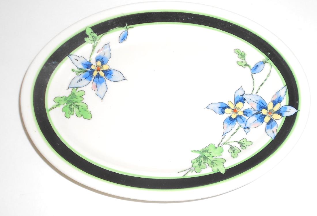 Union Pacific "Columbine" China Platter: A Union Pacific Railroad china platter in the "Columbine" pattern. Columbine is the State Flower of Colorado. This platter measures 8" by 5 3/4". It has an "Old Ivory" OPCo (Syracuse) backstamp. There