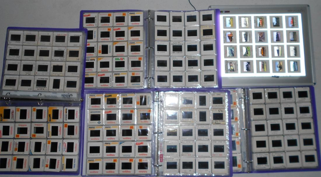 Main Line, Diesel Locomotives Slides (820): A group of 4 notebooks with around 200 slides per book. All have protective sleeves. All 4 books have main line action with diverse geography.