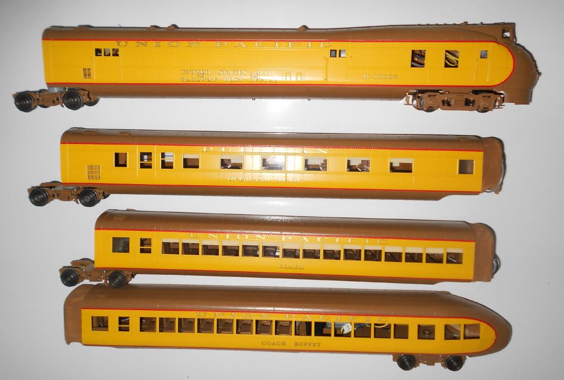 O Scale Brass Sunset UP M-10000 f/p: Sunset O Scale brass Union Pacific Railroad M-10000. 4 unit with factory paint. Made in China in 2003 (from the label). This is a 2 rail version. It shows no wheel wear, electric connectors are tucked