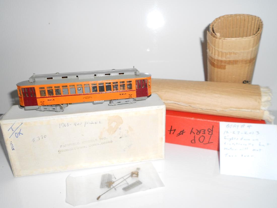 HO Brass Fairfield Boston Birney as #5214: An earlier Japanese piece of brass. Pretty good paint. Our consignor has a note that says the motor is not turning over. Typical of these older models. The box has the Fairfield stamp on the bottom. I