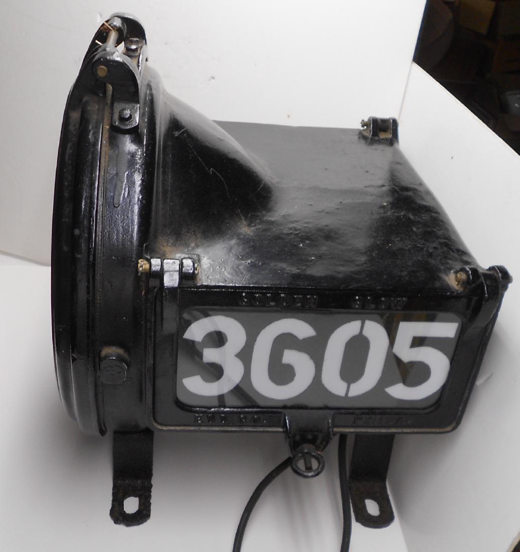 New Haven Steam Locomotive Headlight 3605: A very nice Golden Glow steam locomotive headlight. It has a 14" visible area for the lens. The outer diameter is 18". It has a top hinge so we know that it is a New Haven Railroad issue. It was locom