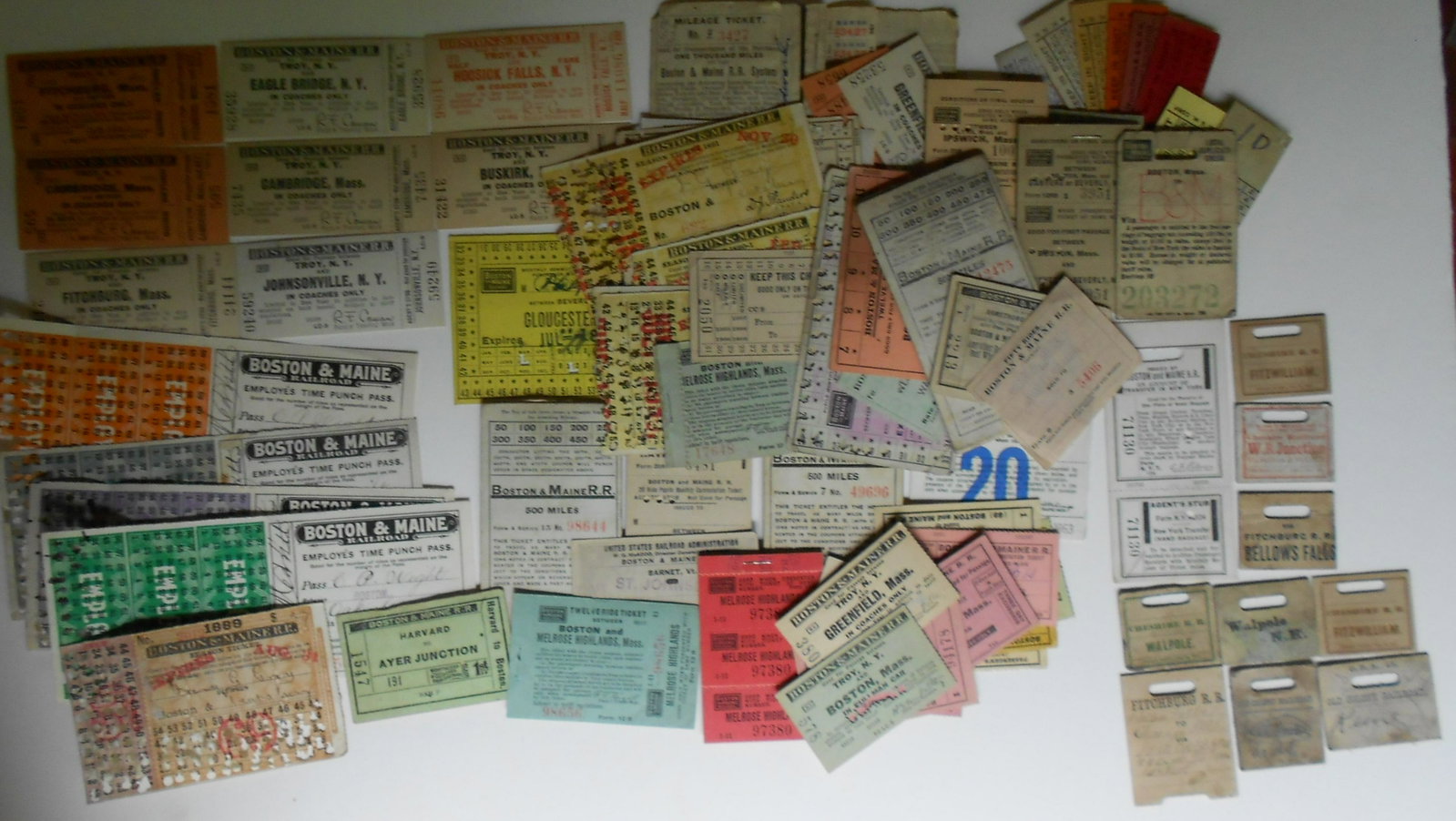 Boston & Maine Tickets & Baggage Checks: Group of Boston & Maine Railroad tickets and related cardstock baggage tags. Many of the tickets have validation stamps on the reverse. Most are 1930s-1950s with a few 1800s.