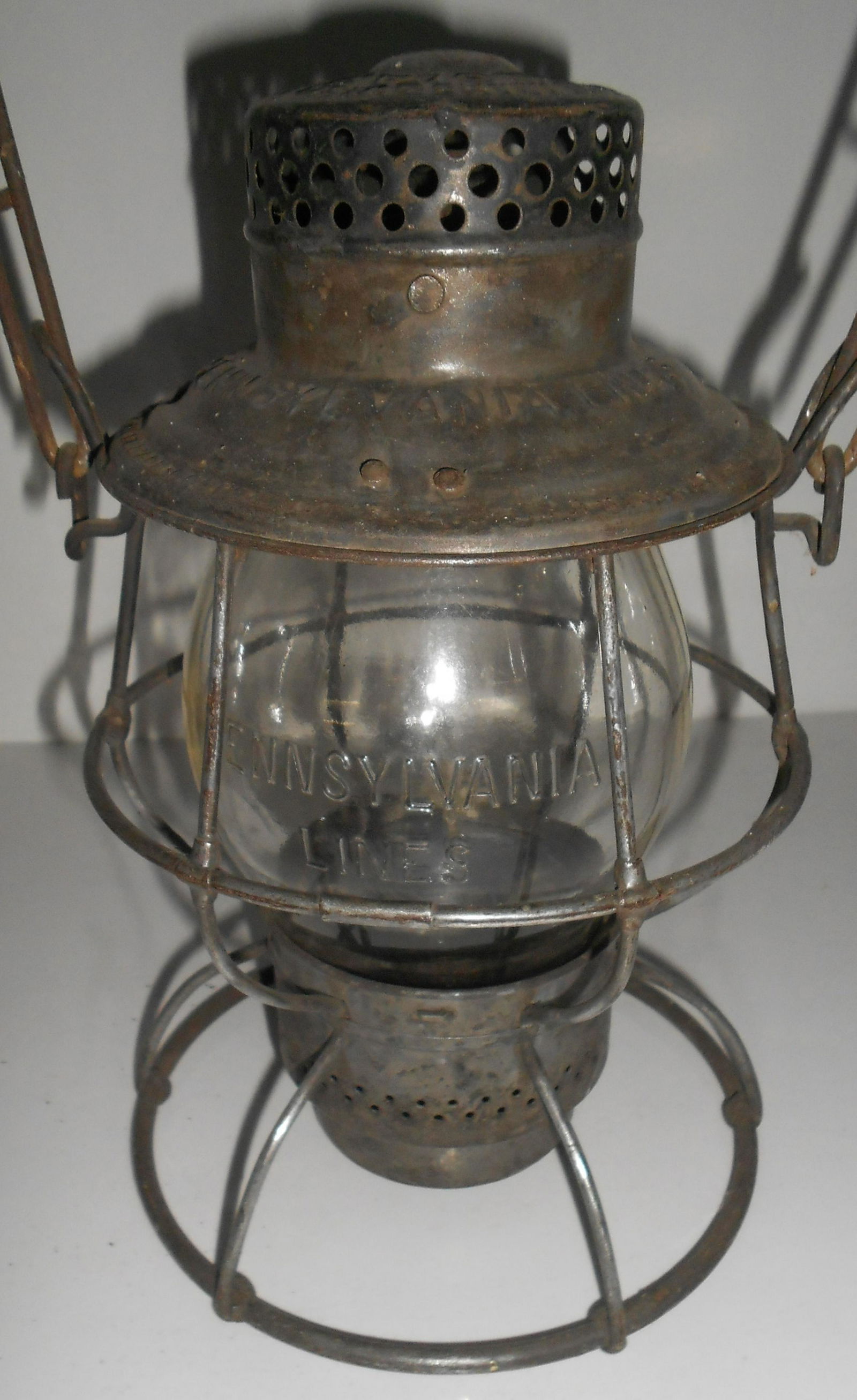 Pennsylvania Lines Railroad Lantern Adlake: Pennsylvania Lines Adlake "Reliable" railroad lantern frame with the name all spelled out and this lantern has the correct spelling. Some are spelled LIENS and made it out of the factory that way. The