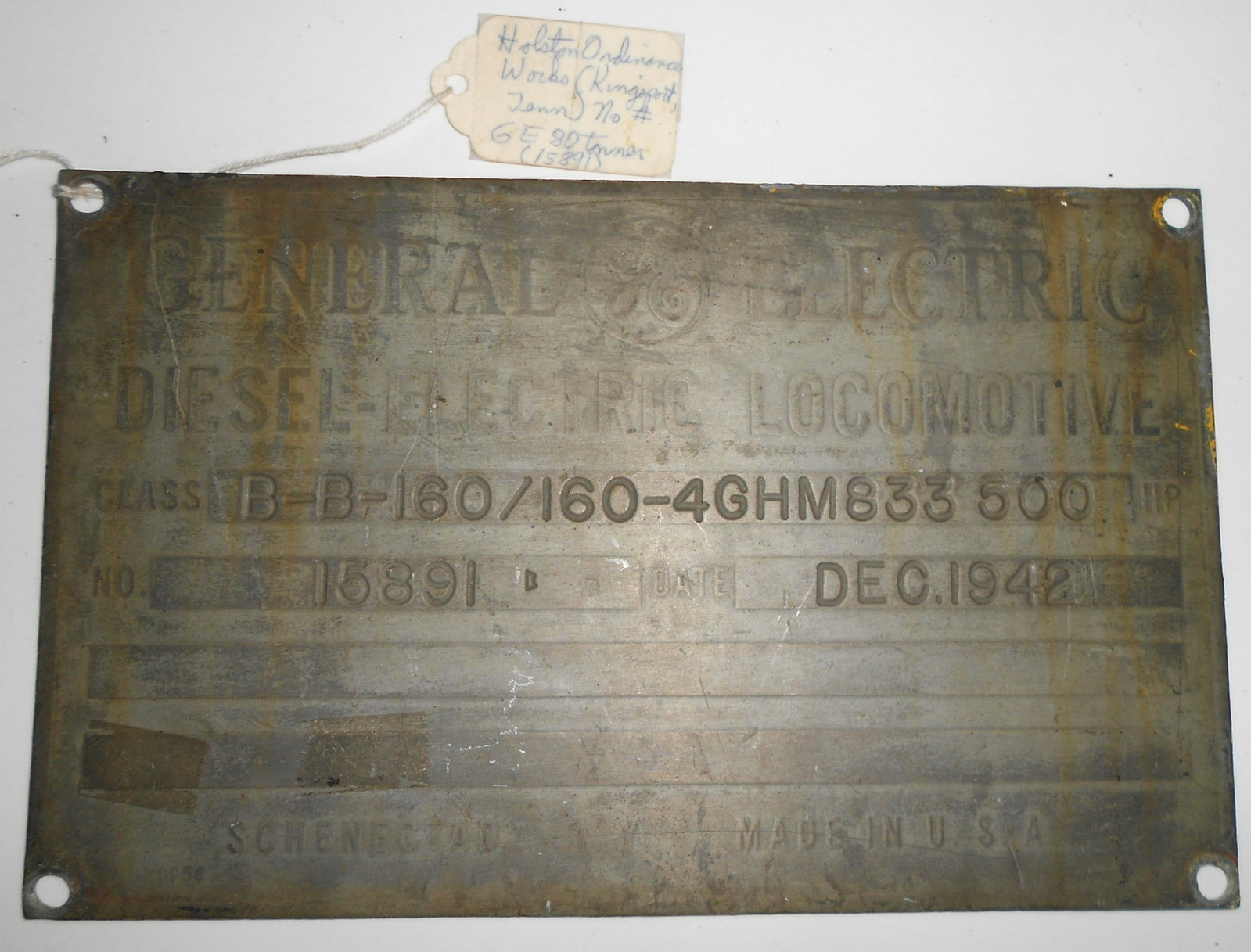 GE Back Plate Holston Ordinance 1942 15891: An unusual 8" by 5" back plate from a GE 80 ton diesel locomotive built in 1942 for the Holston Ordinance Works in Kingsport, Tennessee. During WWII who got to buy locomotives? Holston Ordinance Works