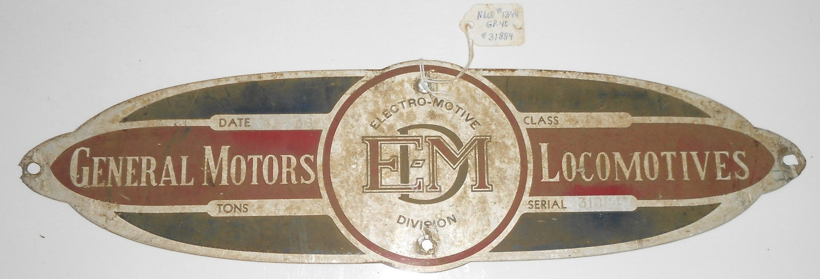 EMD Builder's Plate N&W GP-40 #31884: A General Motors (Electro Motive Division) diesel locomotive builder's plate from Norfolk & Western Railway GP-40 number 1344. This is EMD serial number 31884. This is a standard hot dog plate measuri