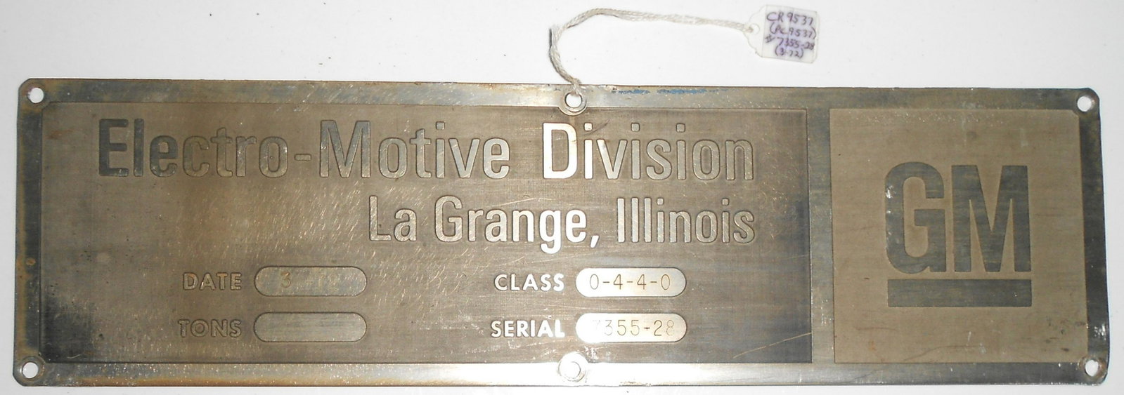 EMD Builder's Plate PC SW-1500 #7355-28: A General Motors (Electro Motive Division) diesel locomotive builder's plate from Penn Central SW-1500 switcher number 9537. This is EMD serial number 7355-28. This is a standard rectangle plate with 