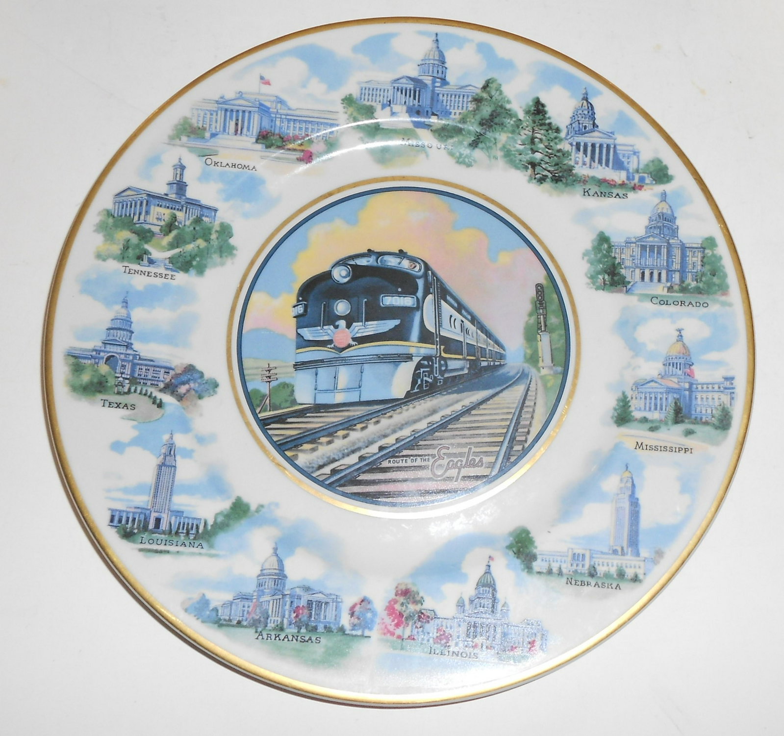 Missouri Pacific "Diesel" Service Plate: The Missouri Pacific followed their flower theme service plates with this Diesel plate featuring state capitols of all of the states that the MoPac went through. It has a prominent Syracuse hallmark o