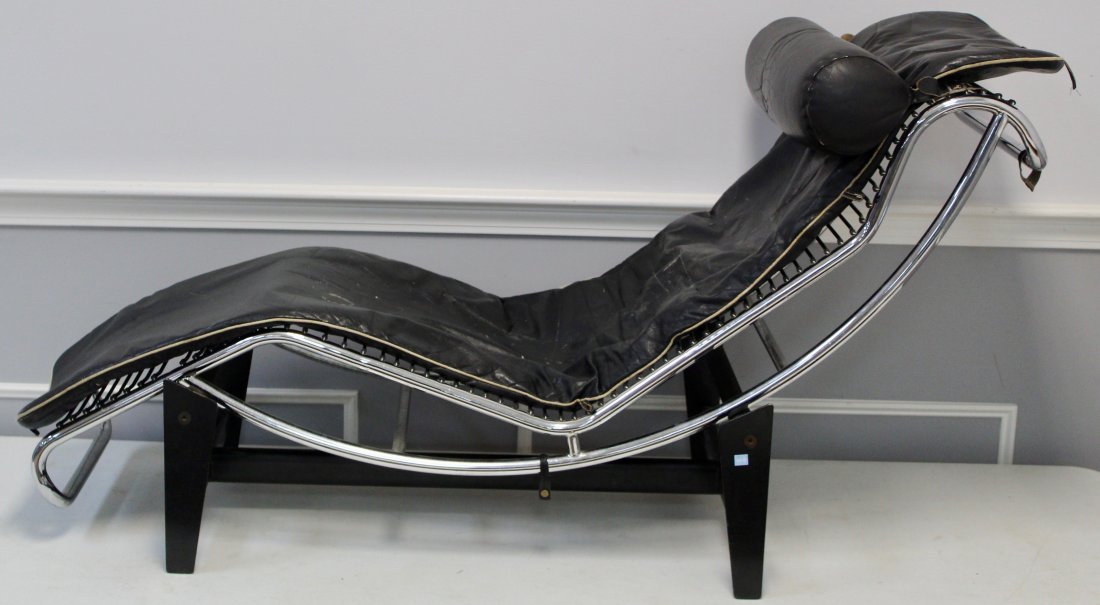 Vintage Chaise Lounge Chair: Le Corbusier and Perriand, LC4 Vintage Chaise Lounge Chair. No marking. Leather is well worn some of the straps that hold it in place have been torn. Chair Frame and base are structurally Sound.
