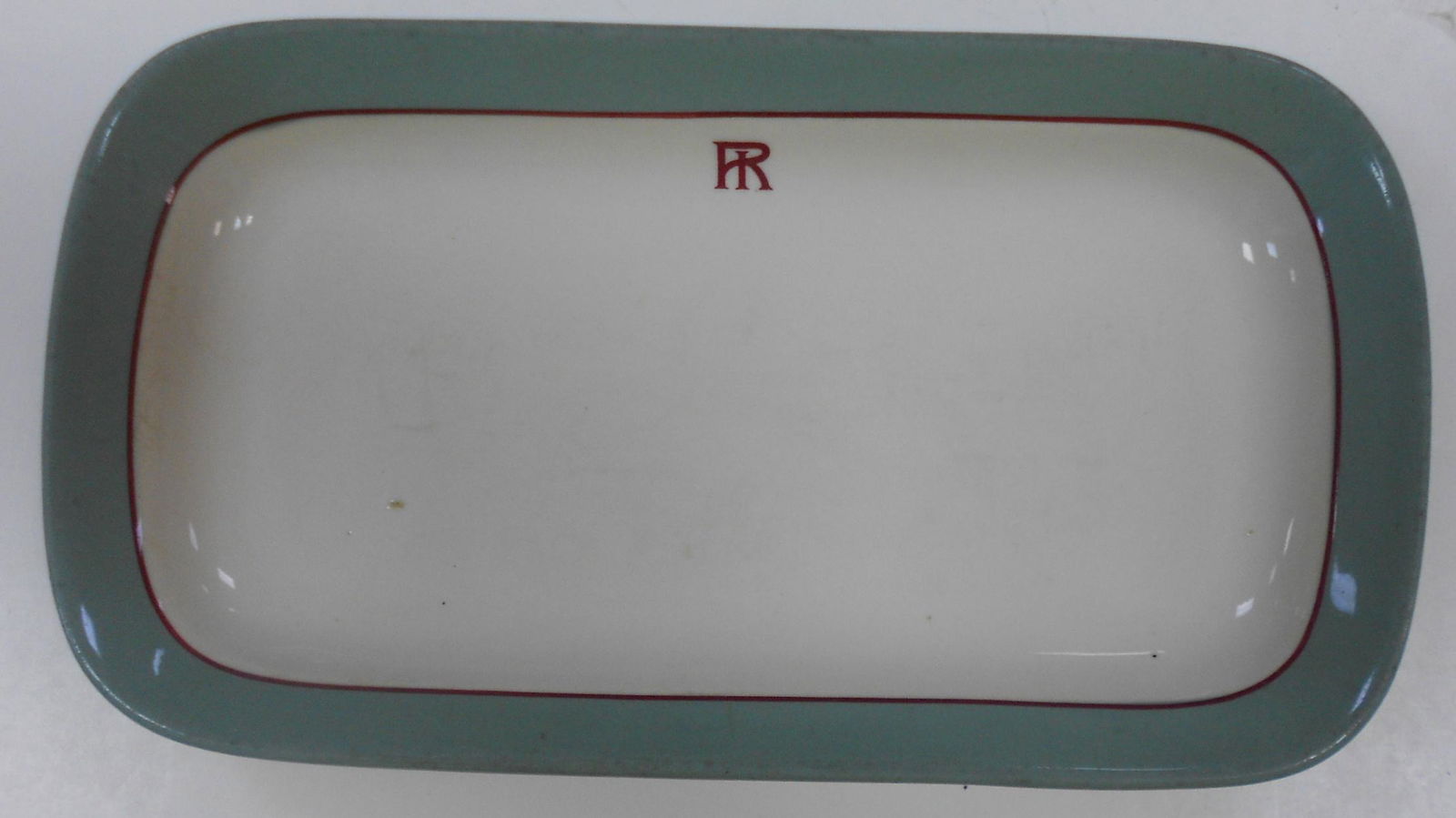 Rock Island Lines "Sage Green" China dish: A very nice Chicago Rock Island & Pacific Railroad rectangular china platter in the "Sage Green" pattern. It measures 11" by 6" and has a nice Buffalo backstamp with the railroad and pattern names inc