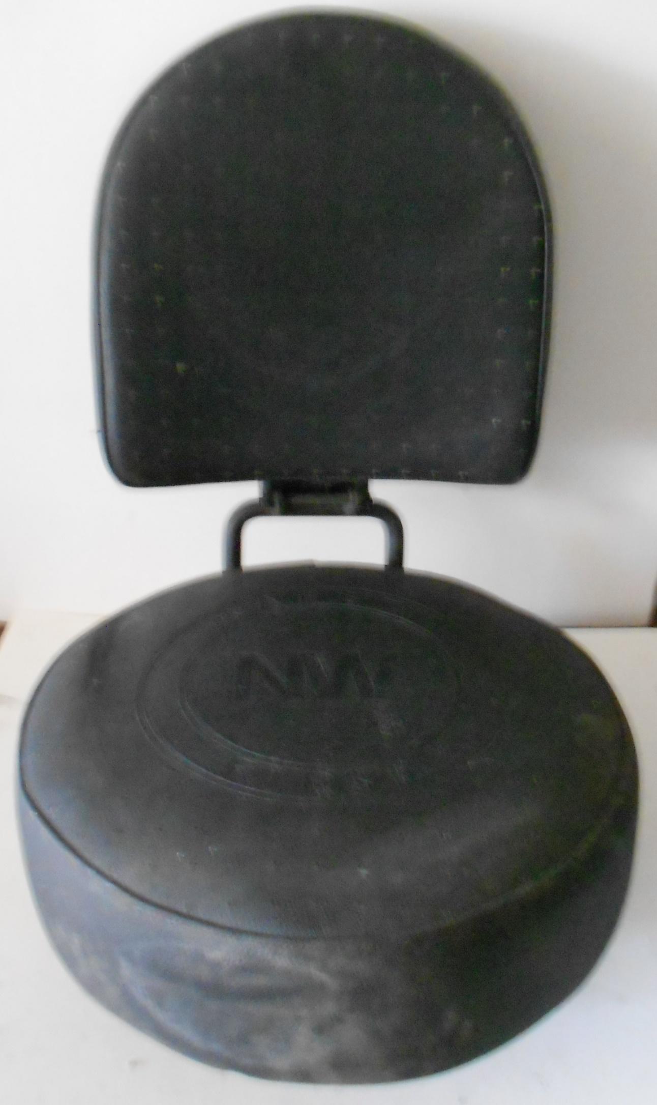 Norfolk & Western Railroad Diesel Locomotive Seat: Our consignor liberated this seat from a Norfolk & Western diesel waiting on a scrap line in 1975. The seat has some standard features like size: 18" diameter and the seat itself without base measures