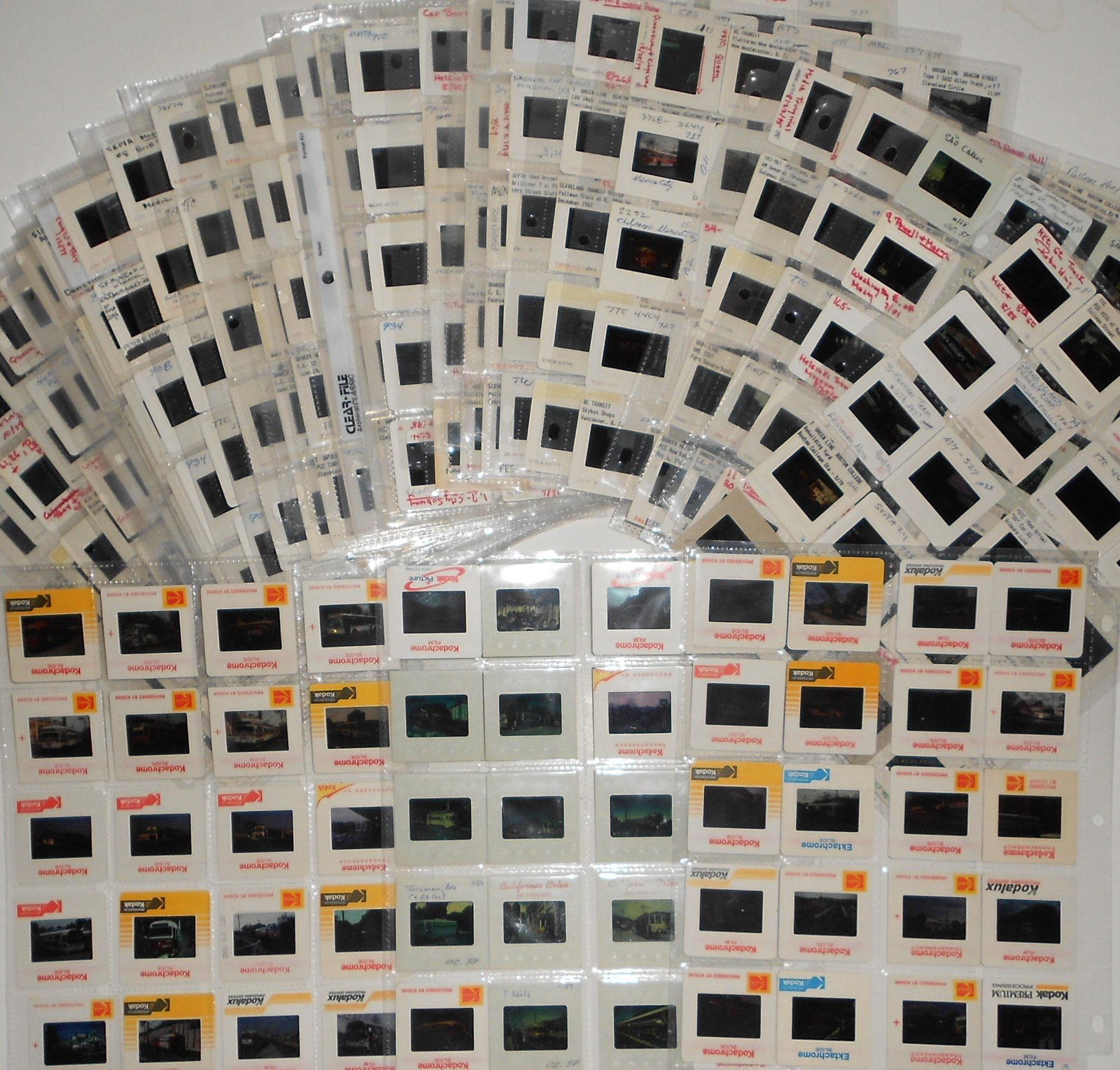 660 Trolley Transit & Bus Color slides: About 660 slides of electric lines, trolleys bus and transit subjects. All have protective sleeves and my photos lack clarity because they are on the light table in sleeves and my pics are through the