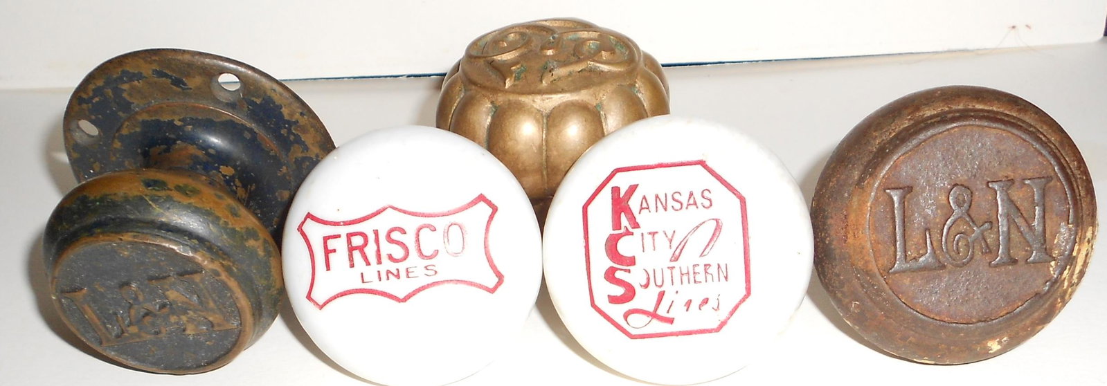 Railroad Door Knobs (5) KCS, RI, L&N, CE?: 5 unusual Door Knobs: Ceramic Kansas City Southern Lines, Frisco Lines also ceramic - like glass. 2 cast iron Louisville & Nashville railroad - one with flat plate to mount on door. Last one is unusua