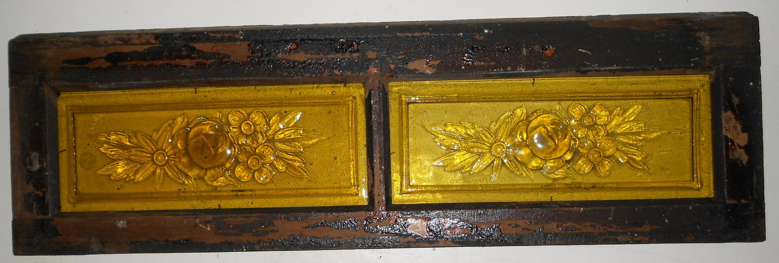 Clerestory Window from old Wooden Coach: An old wooden window with 2 glass inserts. These clerestory windows were applied to early wooden passenger cars to allow ambient light to get in through the roof of cars. This window measures 28 1/2" 