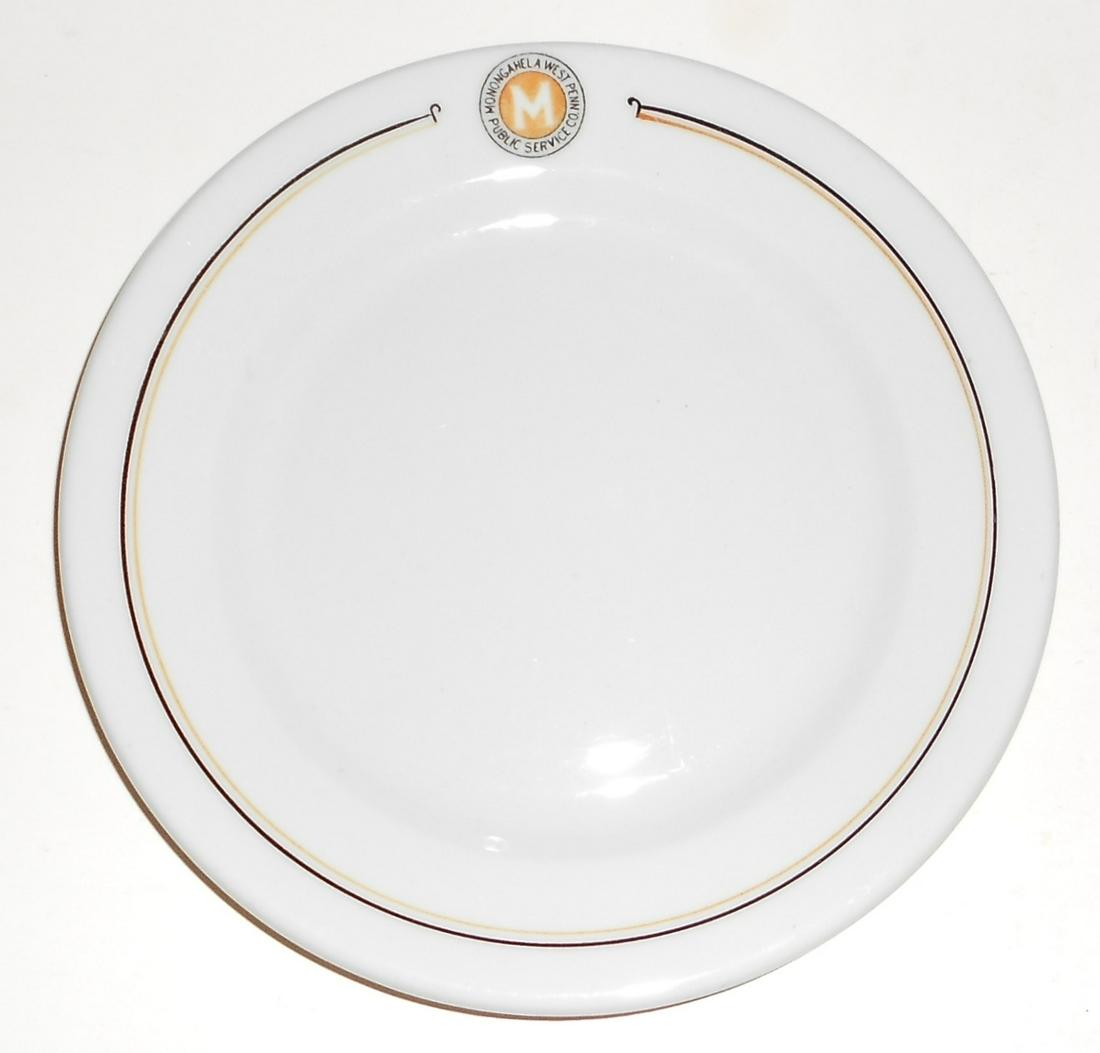 Monongahela & West Penn. China Plate: A 7" china plate from the Monongahela & West Penn Traction Company. This was an electric line in the Pittsburg area. It has a McNicol china backmark. The logo on the front is good with little knife we