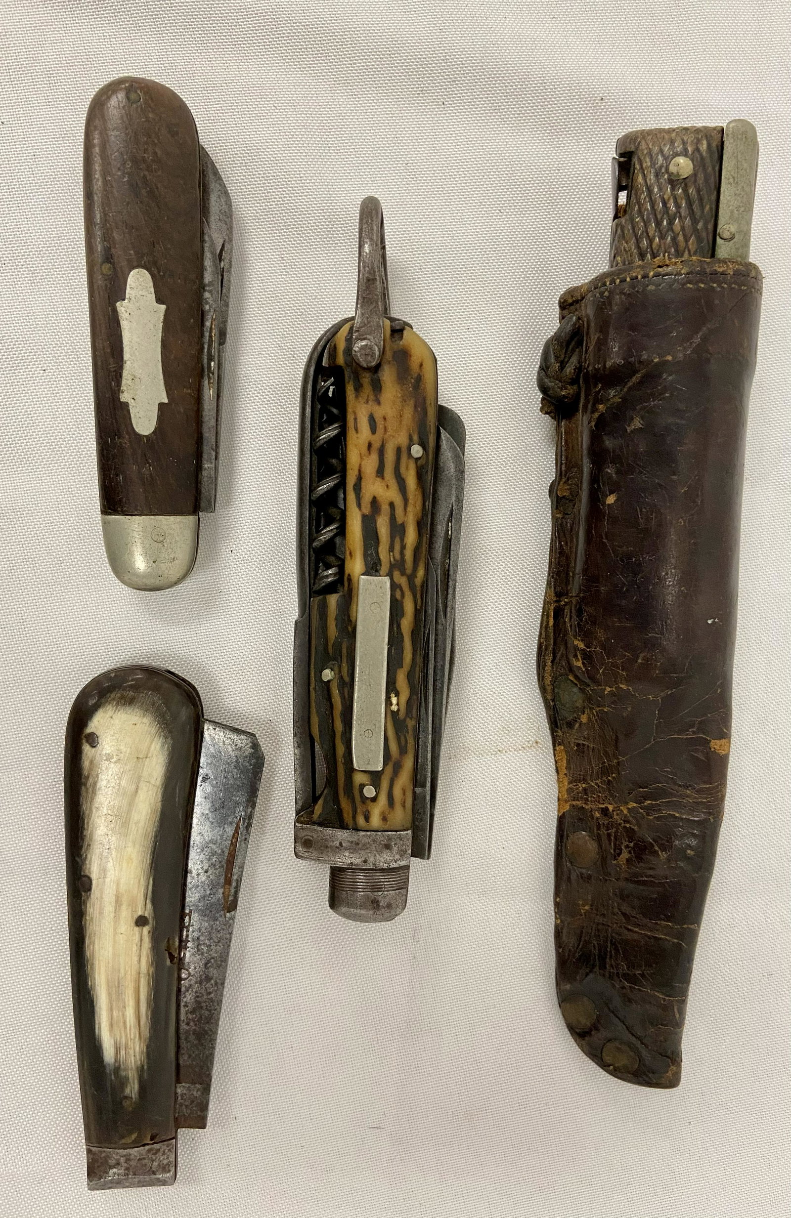Four Antique Knives: Horseman knife, w/assorted blades,etc. Rare Italian folding Bayonet, open measures 11", etc. see photos