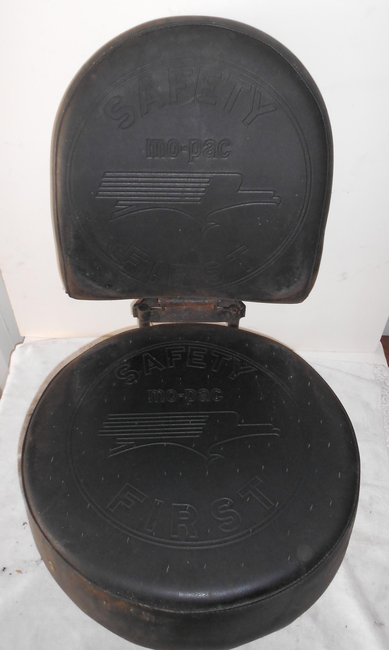 * MoPac Railroad Diesel locomotive Engineer's Seat: Our consignor liberated this seat from a MoPac diesel waiting on a scrap line in 1975. The seat has some standard features like size: 18" diameter and the seat itself without base measures 26" tall wh
