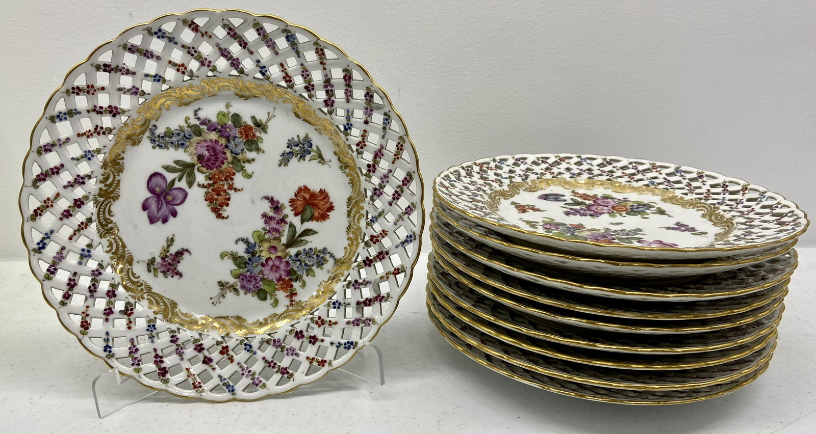 Set of 10 China Plates w/Crossed Swords mark: Set of Ten 9" Floral Decorated China Plates, Crossed sword mark.