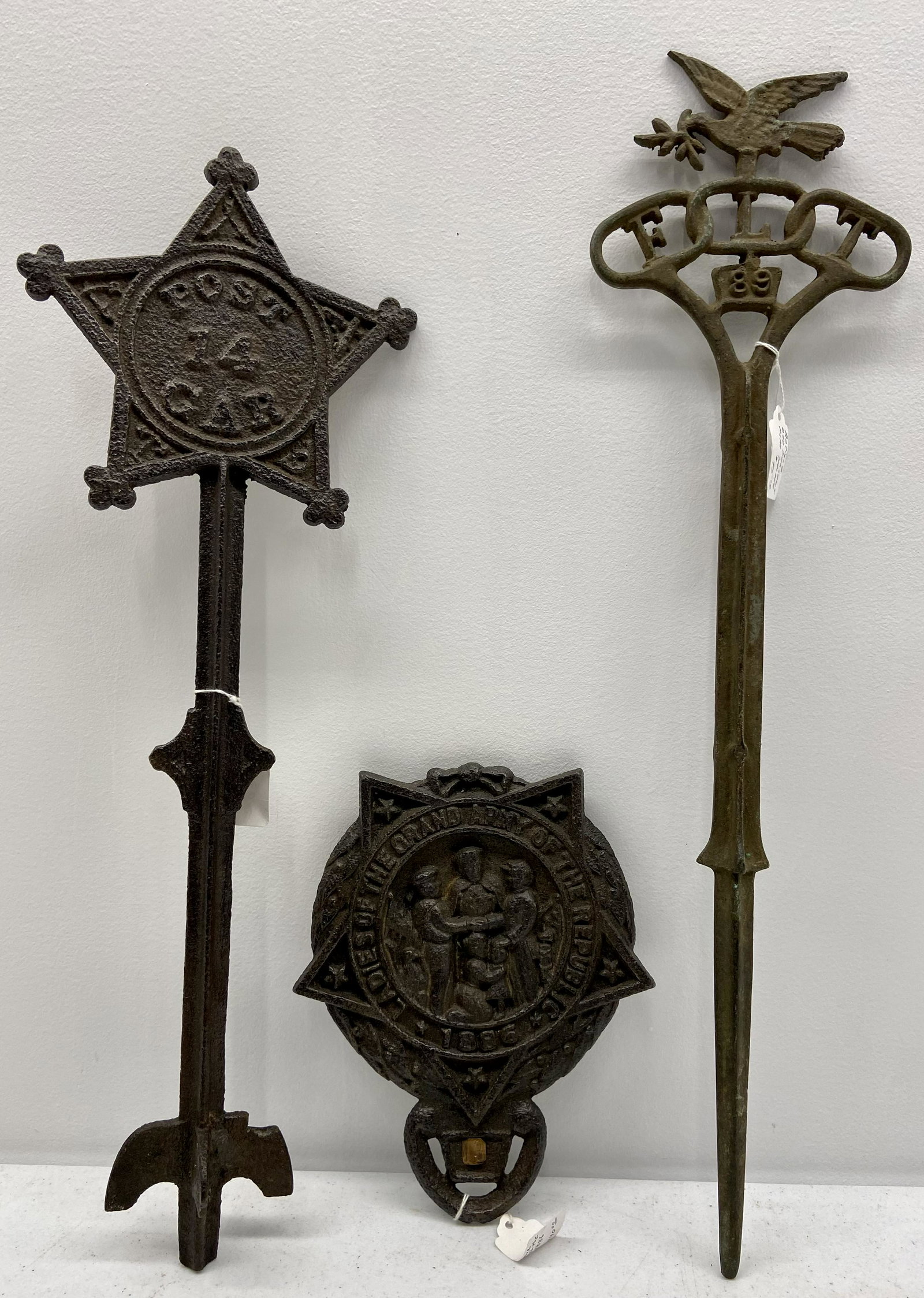 Grave markers/Flag holders: 3 Metal grave markers/Flag. Holders, incl. rare 1886 "Ladies of the Grand Army of the Republic", 9" x 7", Odd Fellows, 22" tall, Post 14" "GAR" 20" tall