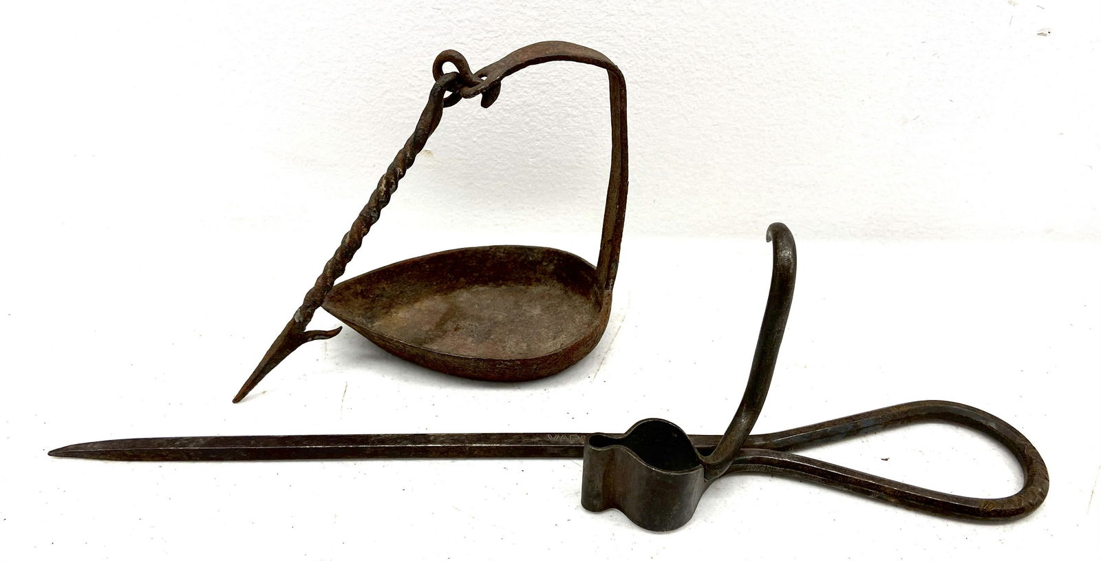 Early Iron Lighting, one signed (1 of 2)