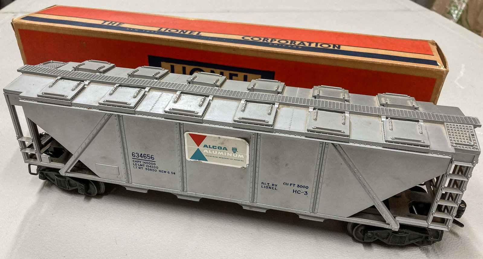 Lionel 4 Boxed Cars: 3646, 50, 3456, 3461: Lionel 4 boxed cars: 3646 Alcoa covered hopper, 50 Gang Car, 3456 N&W Hopper, 3461 Log Car