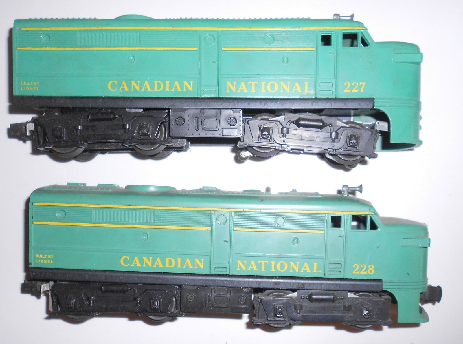 Lionel 227 & 228 CN Diesel Locomotives: Lionel 227 & 228 Canadian National Railway diesel locomotives mad specifically for the Canadian market in 1960-1961. Some use on home layout. Unusual CN green color is original.